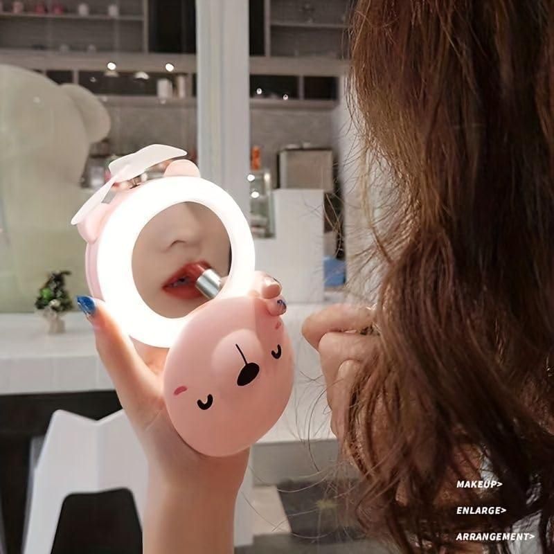 🐷💨 Cartoon Pig Pocket Fan with LED Light & Mirror – 3-in-1 Cute & Cool Companion!