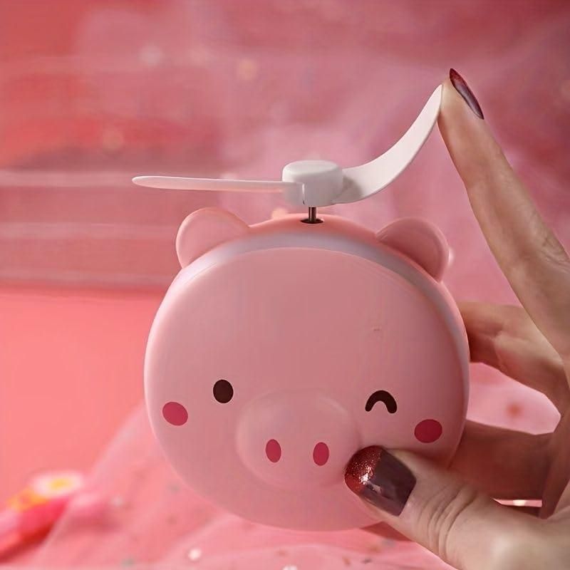🐷💨 Cartoon Pig Pocket Fan with LED Light & Mirror – 3-in-1 Cute & Cool Companion!