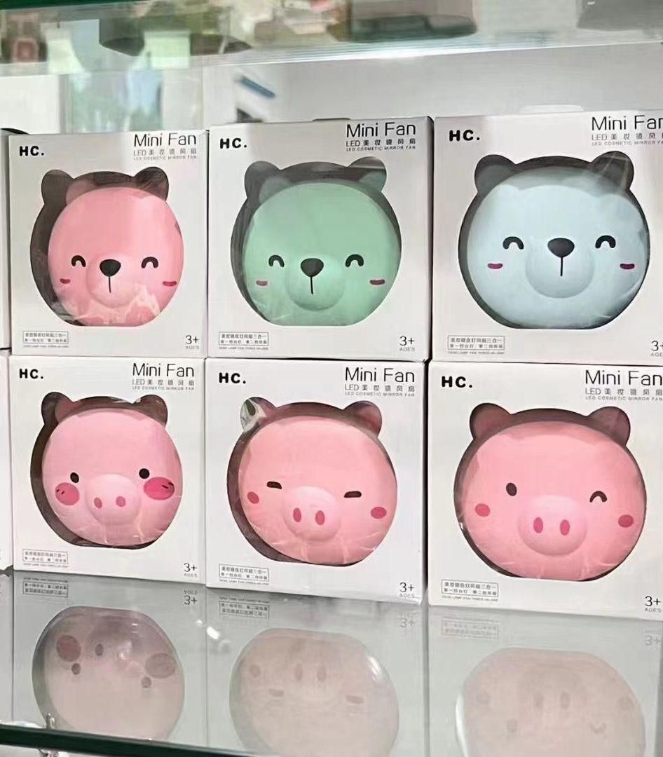🐷💨 Cartoon Pig Pocket Fan with LED Light & Mirror – 3-in-1 Cute & Cool Companion!