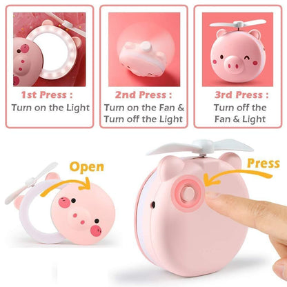 🐷💨 Cartoon Pig Pocket Fan with LED Light & Mirror – 3-in-1 Cute & Cool Companion!